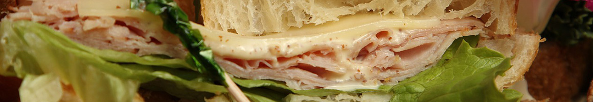 Eating Sandwich at Java Jive restaurant in Hannibal, MO.